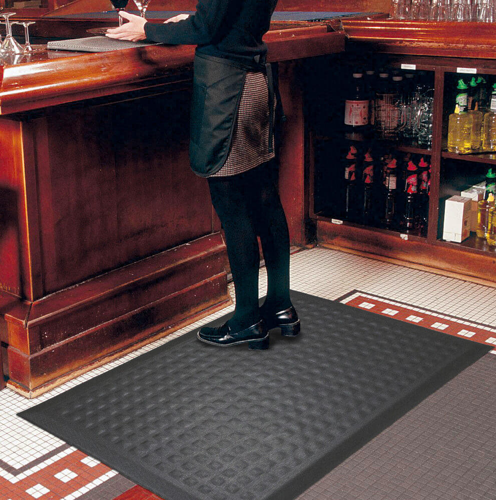 waitress at a bar standing on a Complete-Comfort-IImat