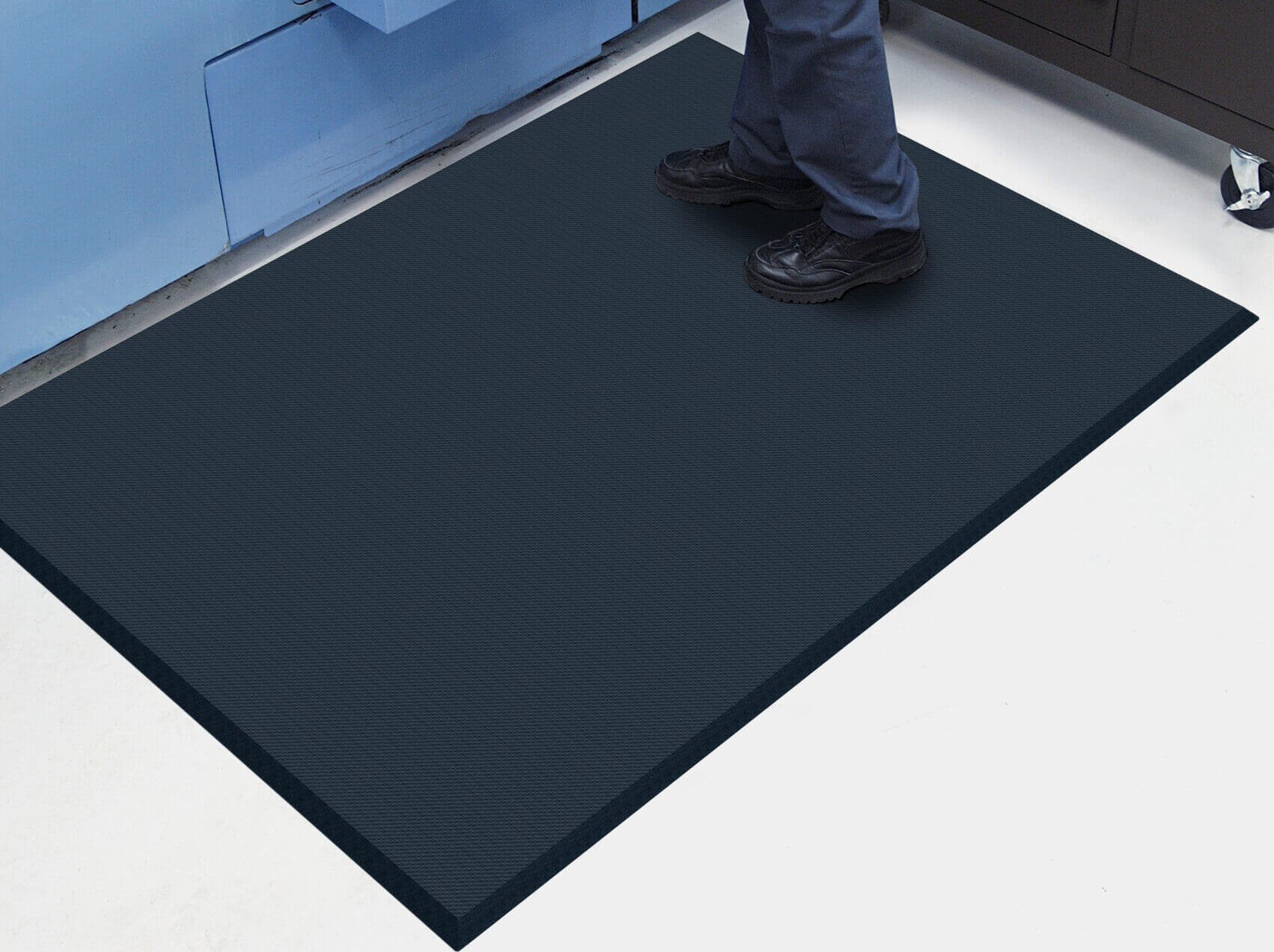 someone standing on an anti-fatique mat