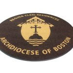 Round Super Berber Logo rug with archdiocese logo