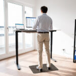 Man,Working,On,Computer,At,Standing,Desk,In,Home,Office